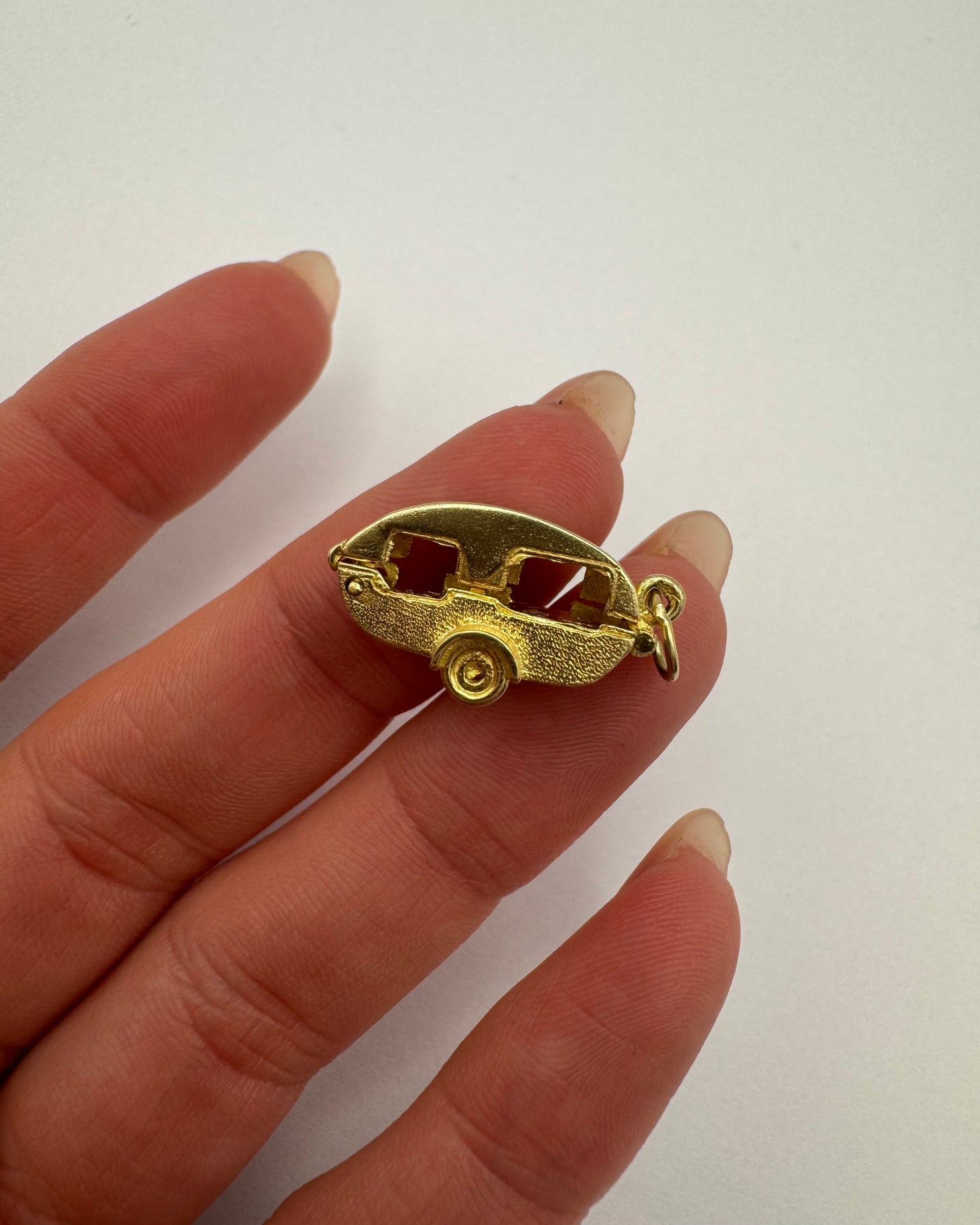 9ct Vintage articulated caravan charm