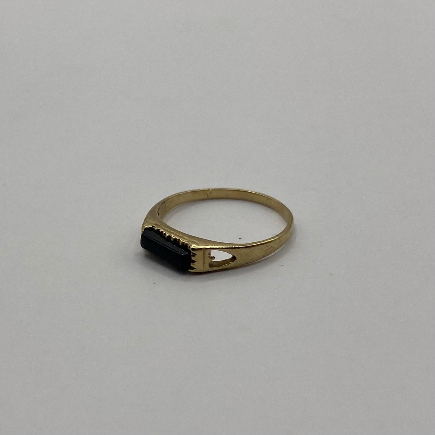 Onxy stacker ring with heart cut out